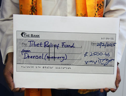 Tibetan director donates £2,500 to support elders in exile