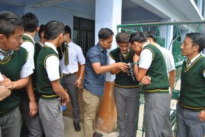 Students at Tibetan Homes Foundation trying out their new camera